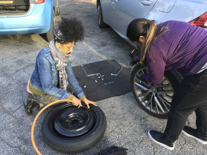 photo of adding air to a spare tire